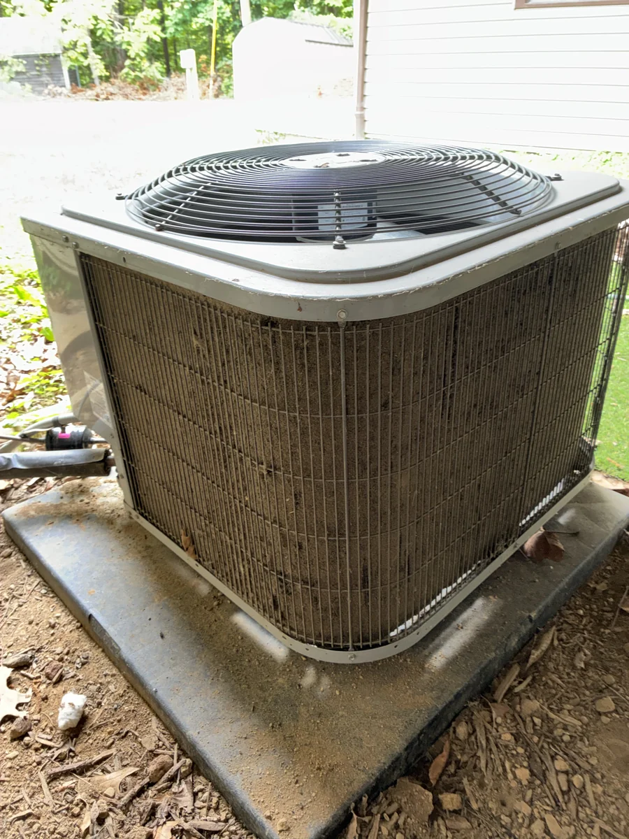 Back of condenser unit before cleaning.